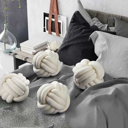 Oreiller en peluche à nœud tissé