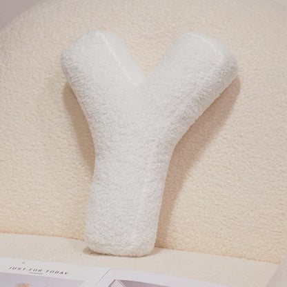 Coussin en peluche en forme de lettre de l'alphabet