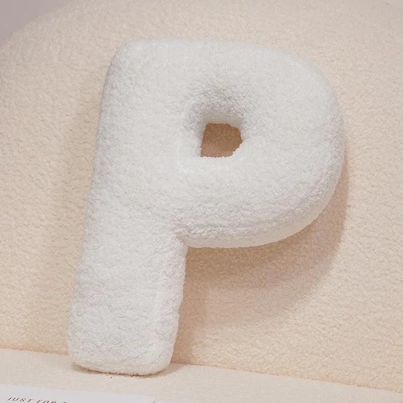 Coussin en peluche en forme de lettre de l'alphabet